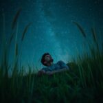 boy looking at the stars